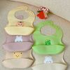 Yếm ăn dặm silicone dáng cong có máng Lion Baby
